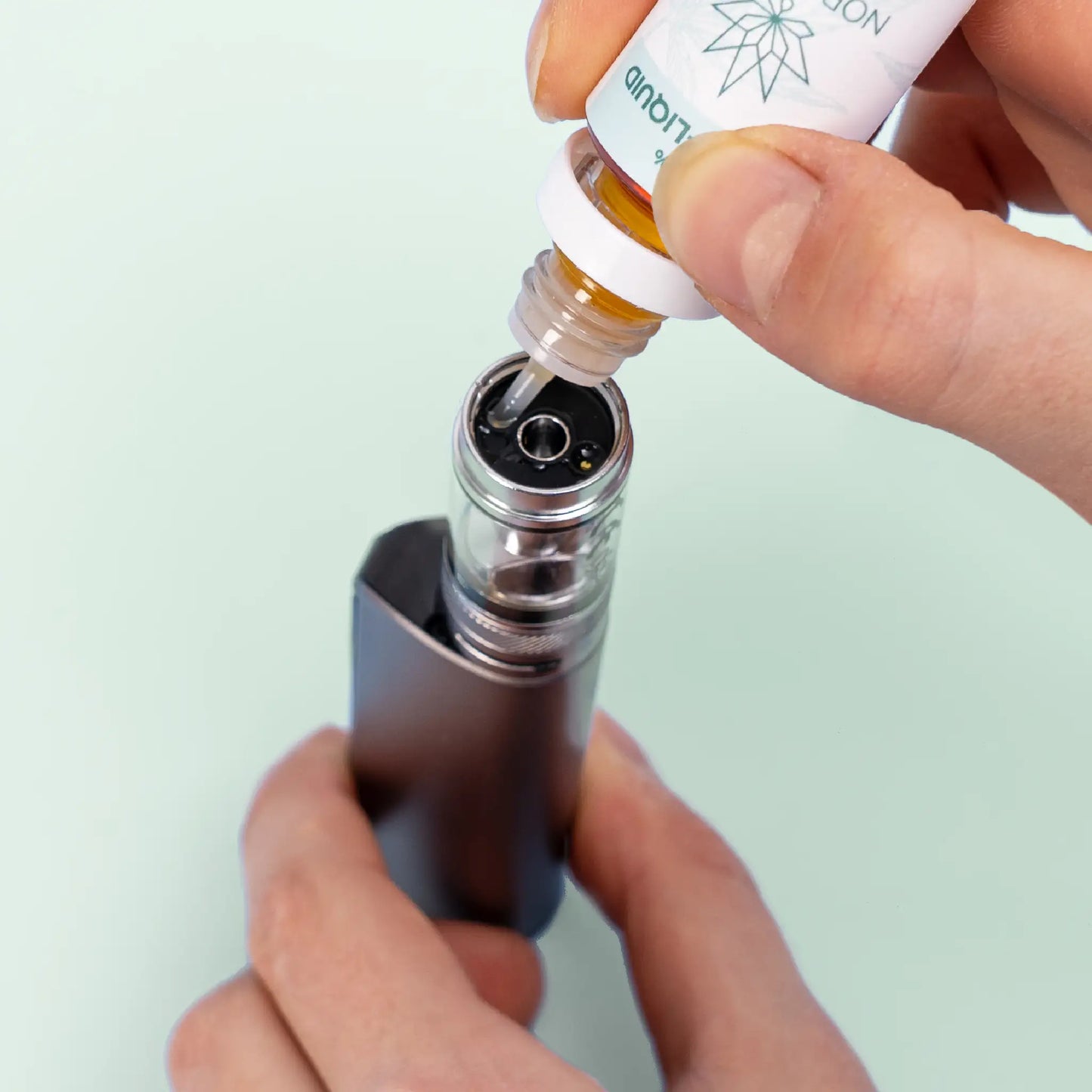 Refilling an E-Cigarette with CBD E-Liquid (5%) from Nordic Oil