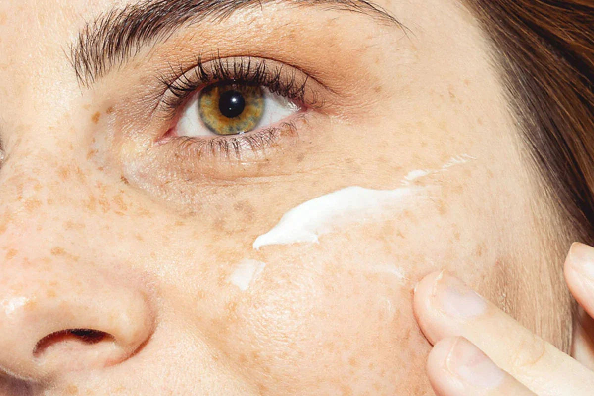 woman using day cream