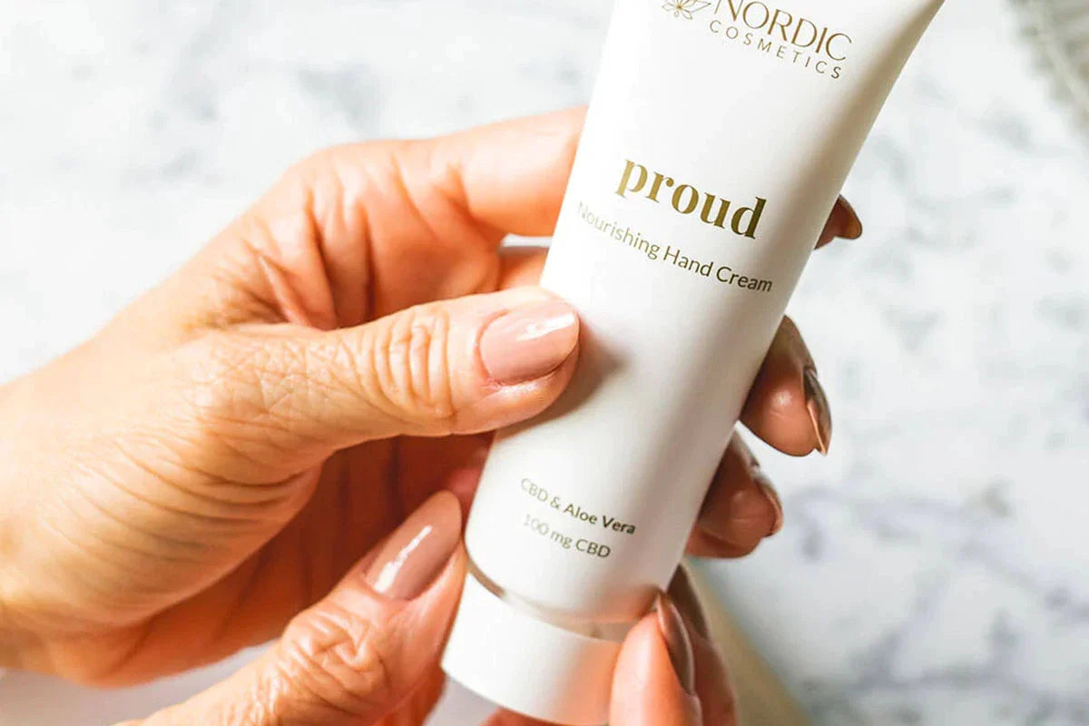 woman holding hand cream