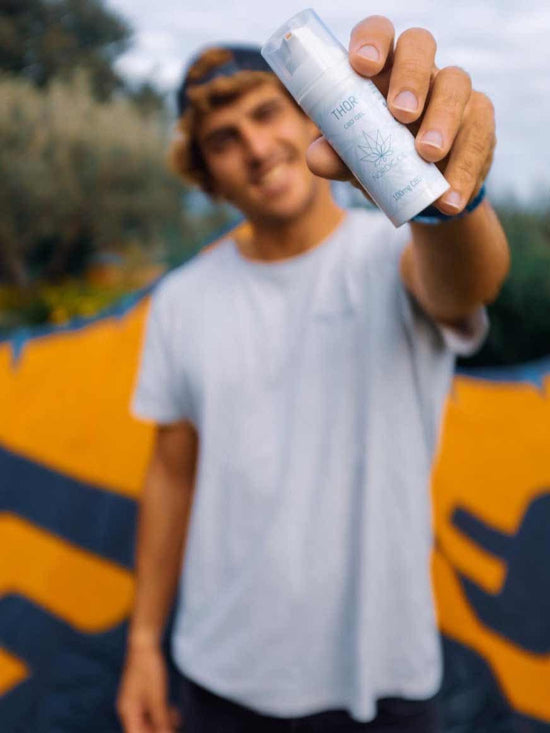 A man is holding Thor CBD gel 